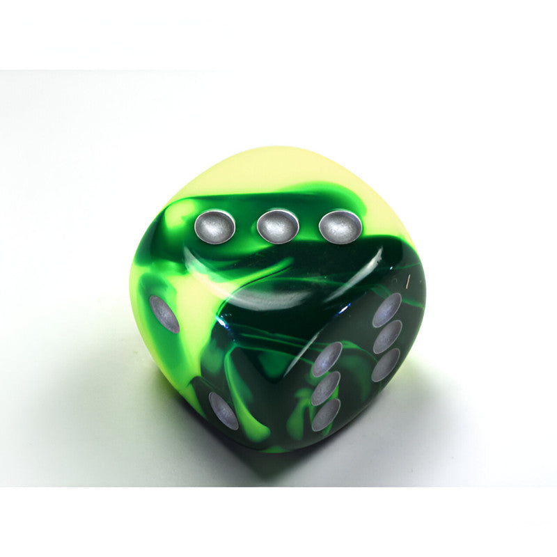 Chessex Gemini Swirled dark and lime green d6 dice with silver pips, showing a '3' face, on white