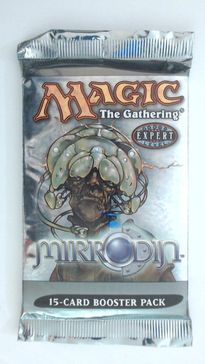 A sealed Magic The Gathering Mirrodin Booster Pack shows a metallic-headed creature, an Expert Level indicator, and reads 15-card Booster Pack