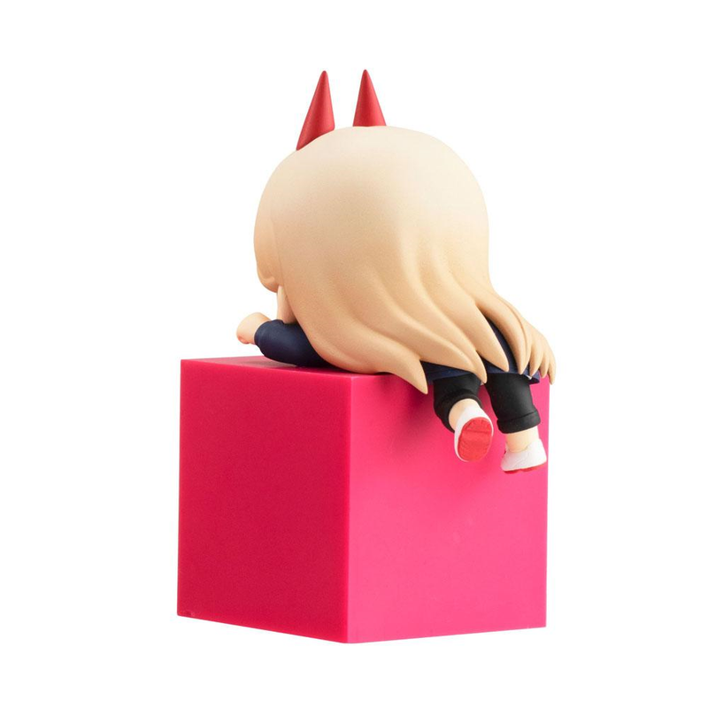 Chainsaw Man Power sitting on a pink cube facing away with hair covering back