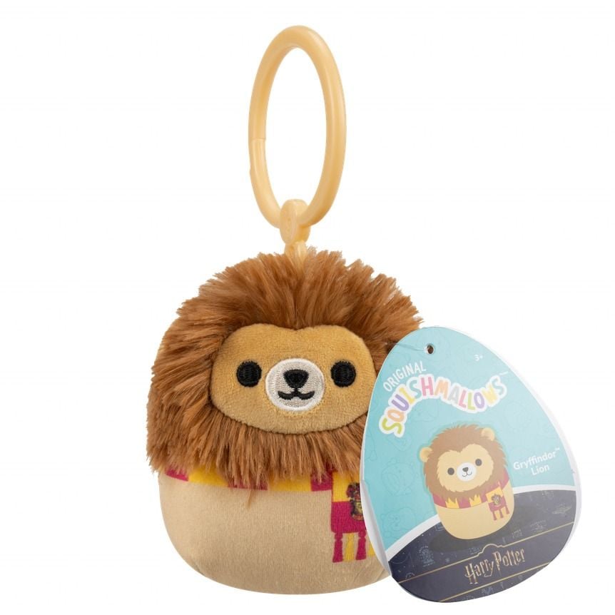 This Harry Potter Squishmallows mini clip is a plush Gryffindor Lion mascot wearing a red and gold scarf with an attached tan plastic clip and visible product tag