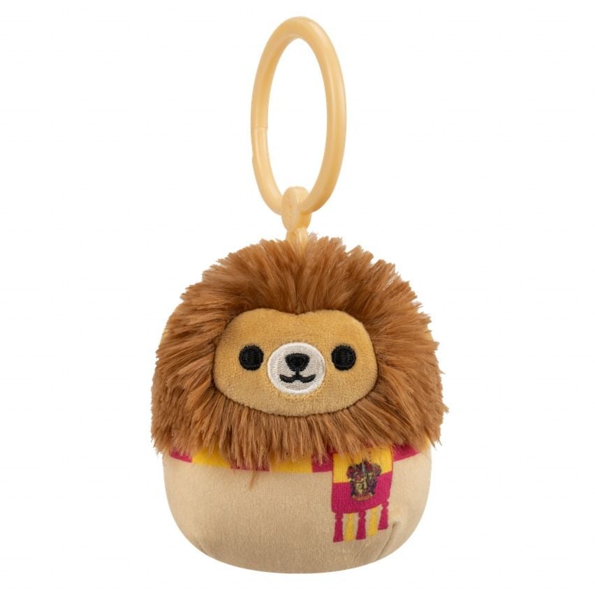 This Harry Potter Squishmallows mini clip is a plush Gryffindor Lion mascot wearing a red and gold scarf with an attached tan plastic clip with white background