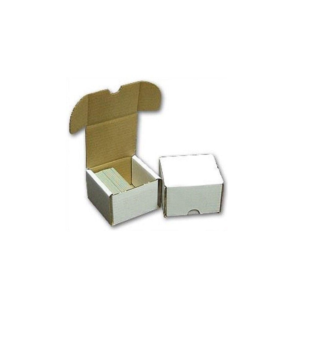 Two small white card storage boxes; one open holding cards, one closed