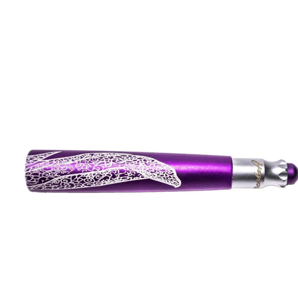 Purple metallic tool with intricate white filigree dolphin pattern and silver end cap