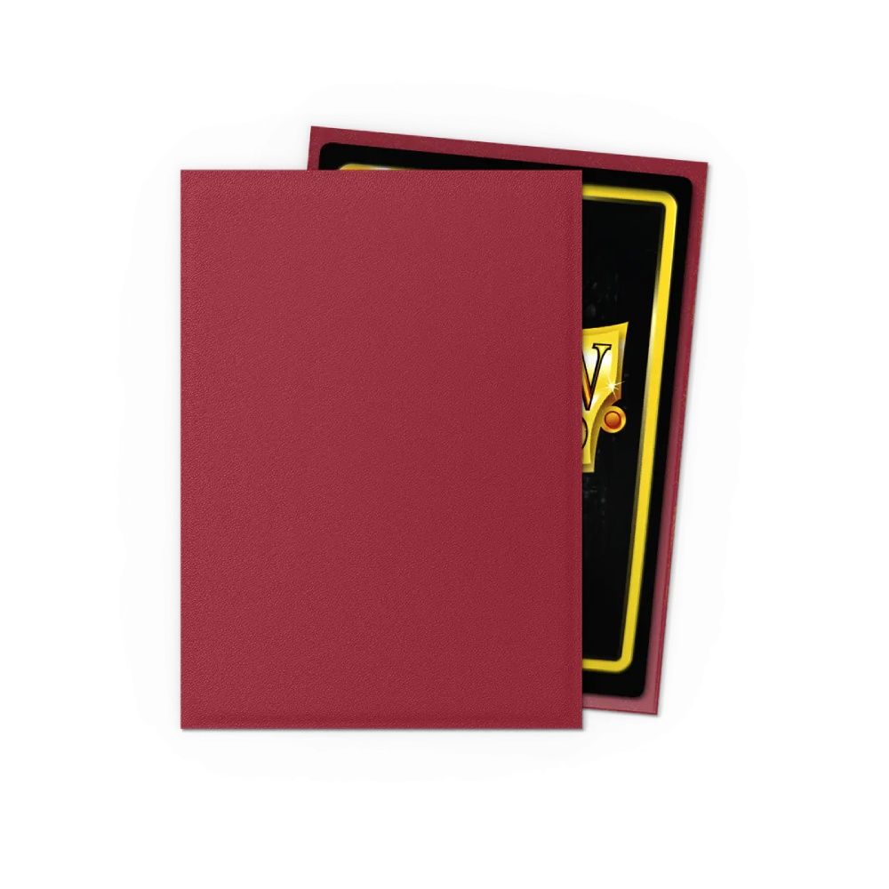 Matte burgundy card sleeve covering a trading card with a gold border and black background