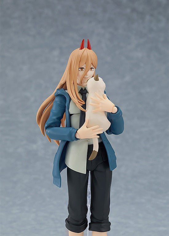 Orange-haired figure in a blue jacket and black tie holding a white cat