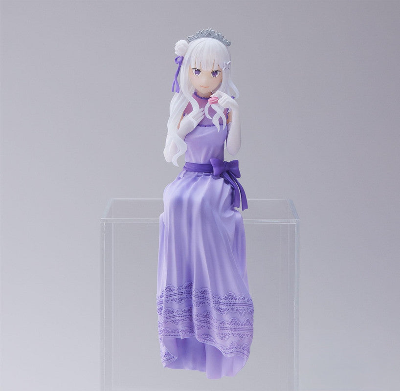 Figure of a character with long white hair and purple eyes wearing a lavender ball gown with white gloves and silver crown