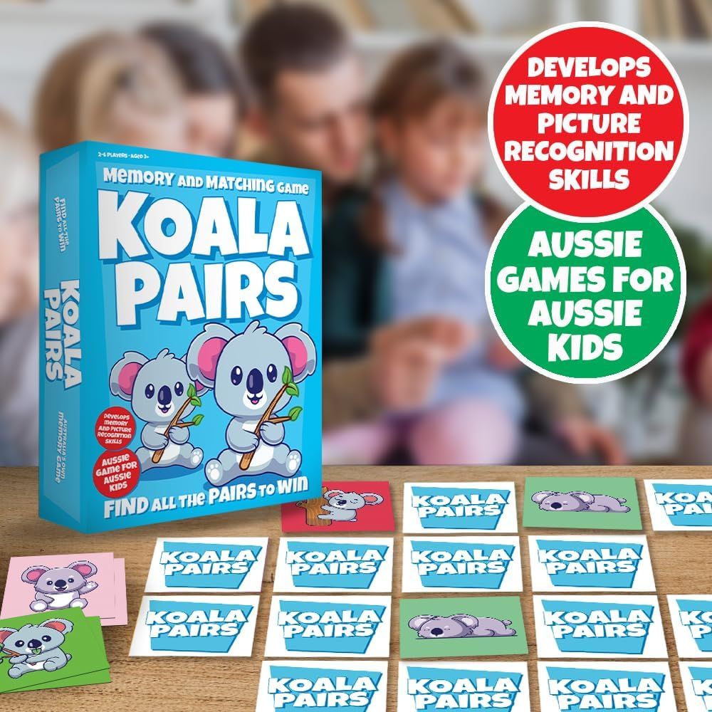 Koala Pairs memory game box and cards displayed on a table with a family playing in the background