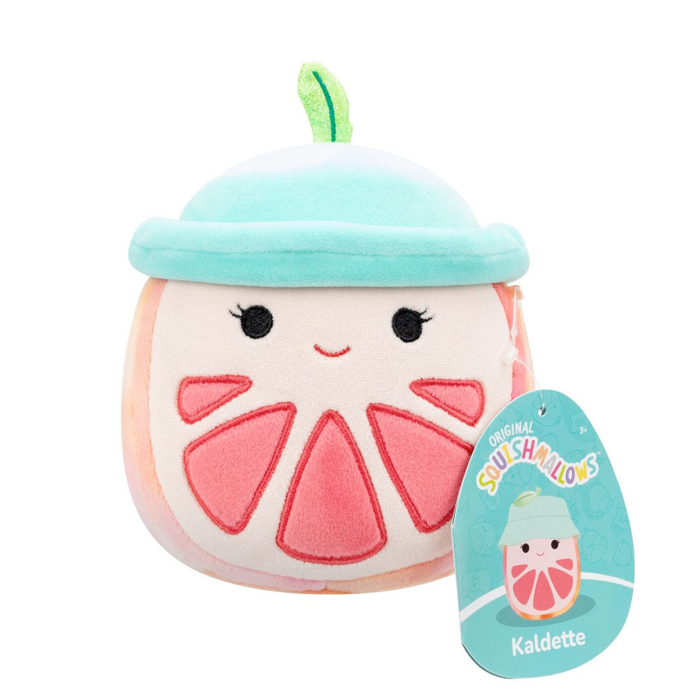 Kaldette Squishmallow plush: a smiling pink grapefruit wedge with a light blue hat and green leaf, displayed on white
