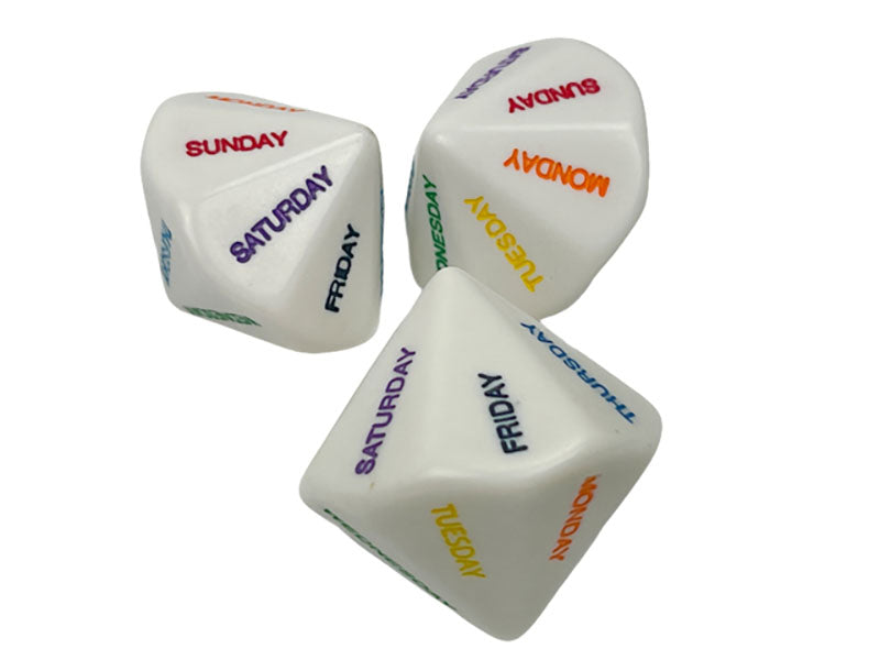 Three white 14 sided dice with multicolour 7 Days of The Week showing on a white background