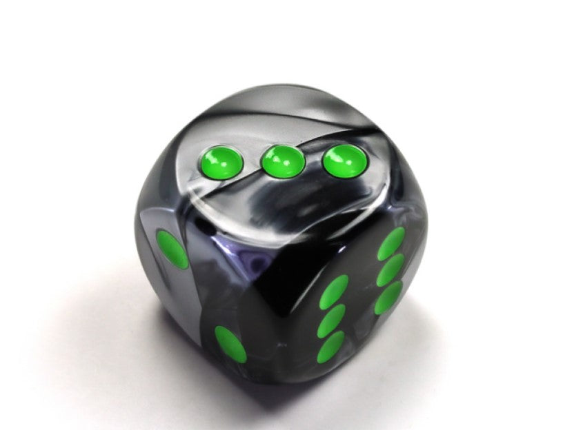Black Grey and Green die showing 2, 3 and 6 faces with green pips visible, on a white background