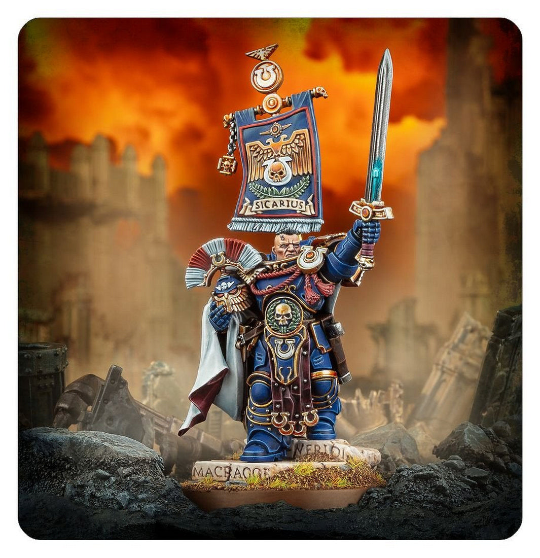 Miniature of Ultramarines Captain Sicarius in blue armor, raising a glowing sword and banner over a ruined battlefield