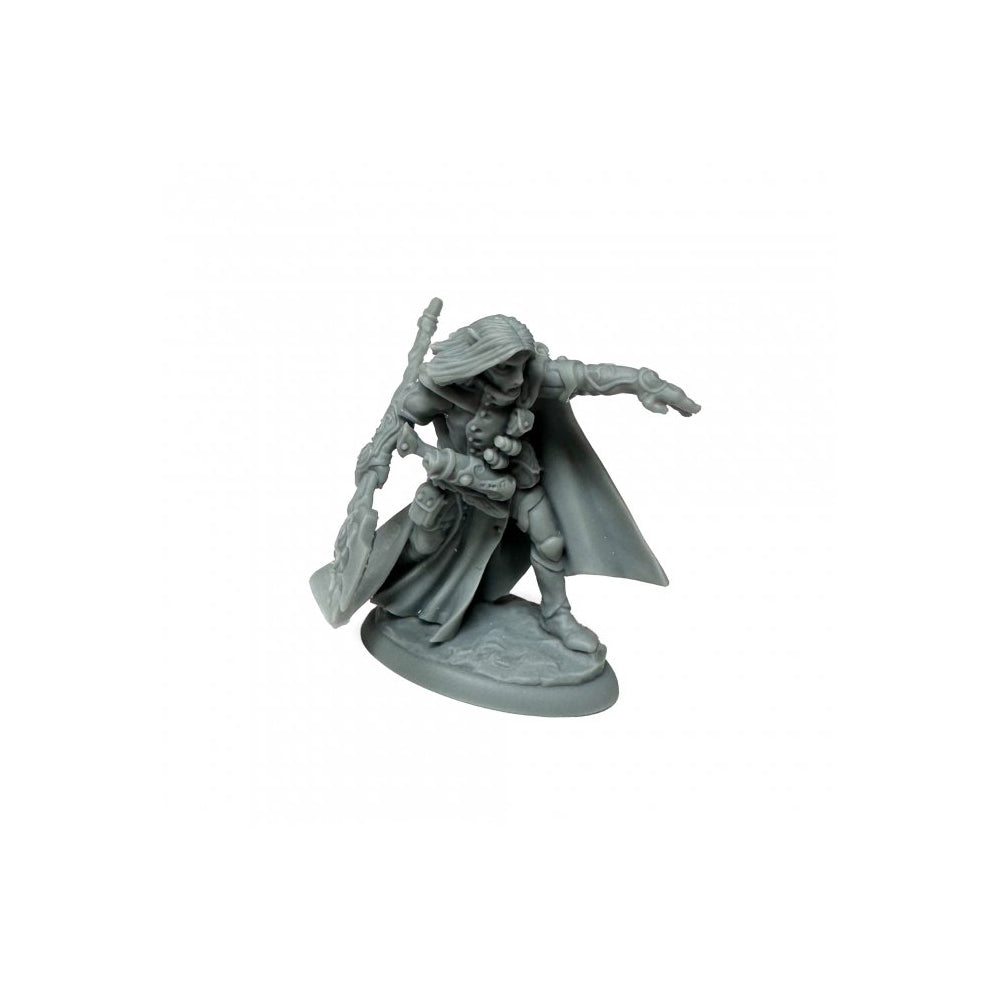 Unpainted plastic miniature of a cloaked fantasy adventurer holding a staff or spear and pointing, standing on a round base