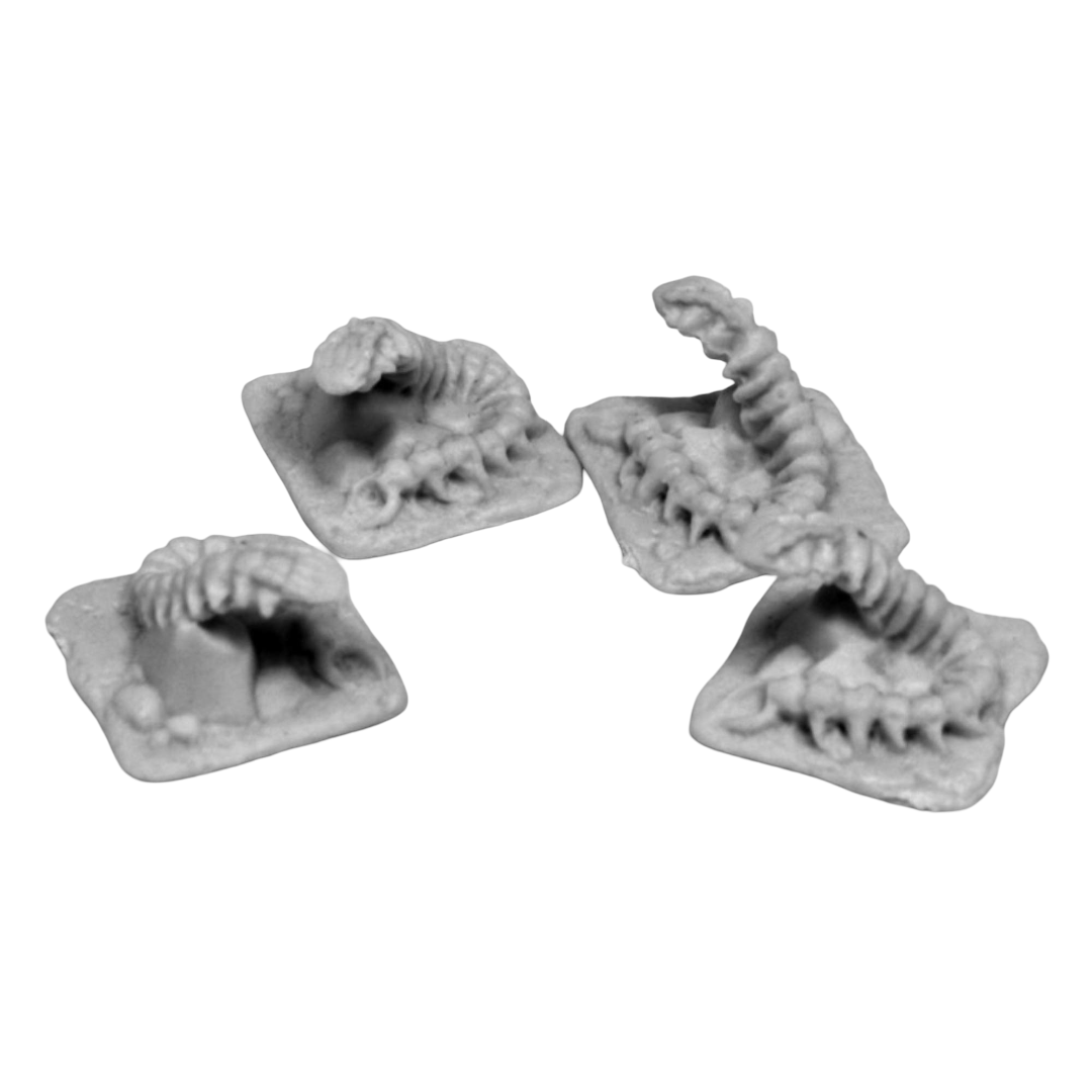 Four grey Reaper Bones Dungeon Vermin Centipede miniatures on square bases, with segmented bodies emerging upwards