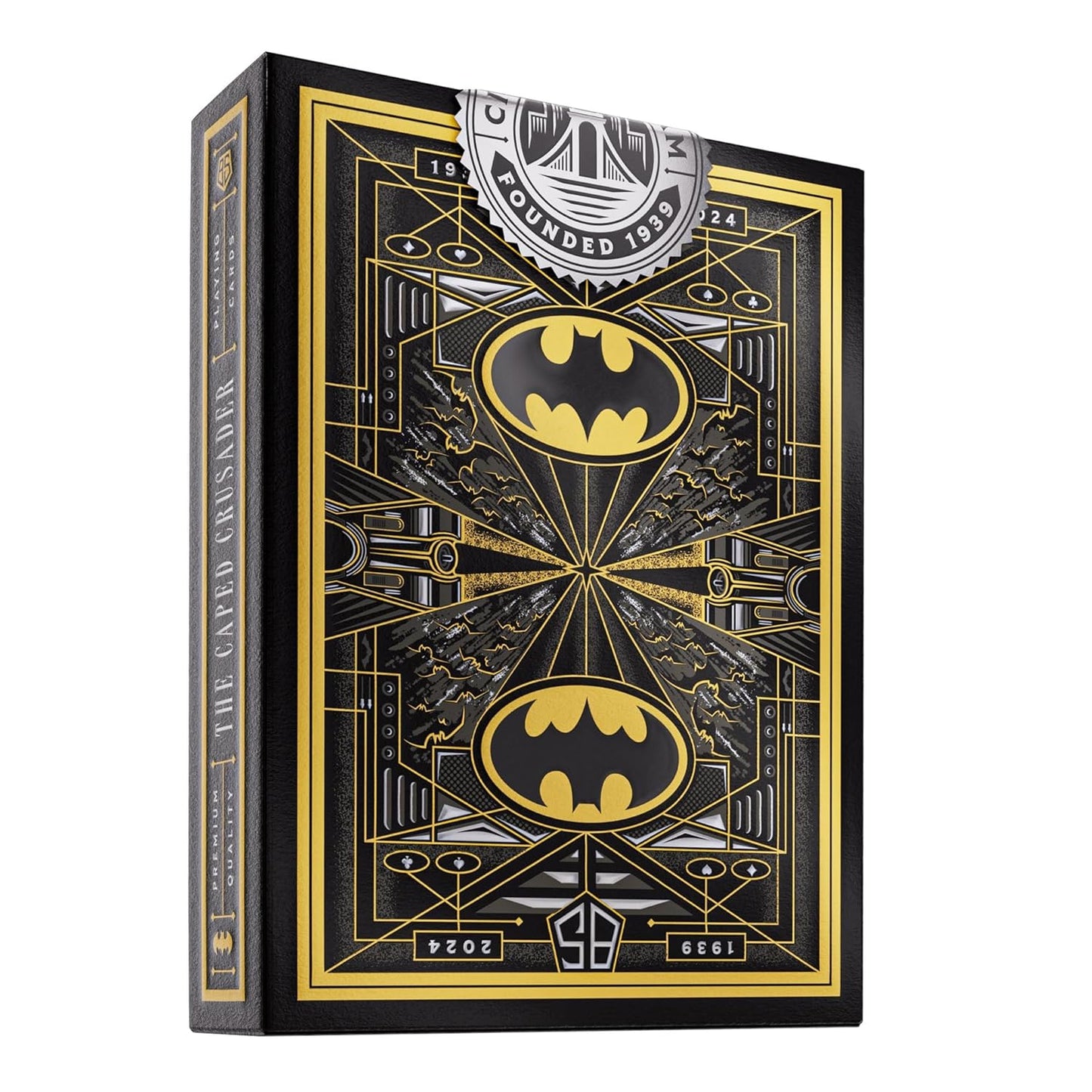 Black and gold premium playing card box for "The Caped Crusader" Batman deck, featuring two Bat-symbols