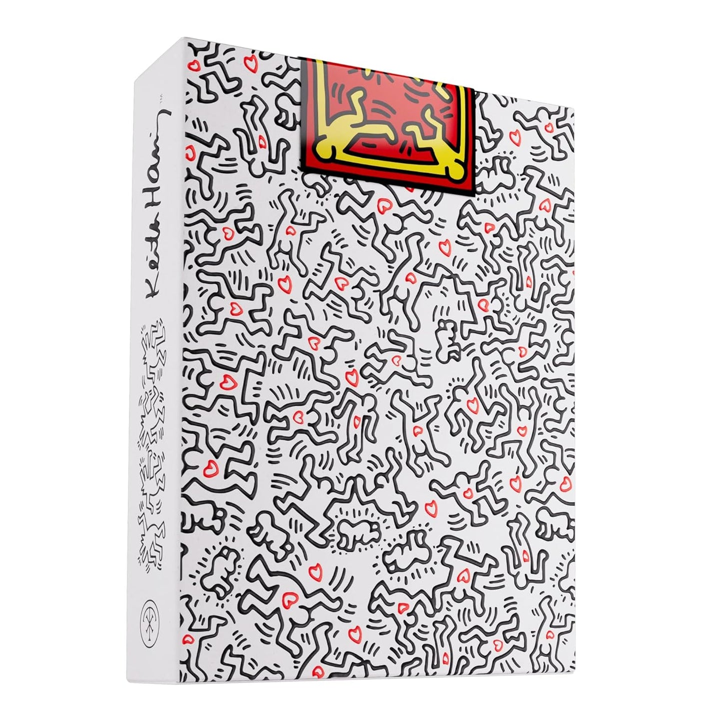 White product box covered in Keith Haring's iconic black line art figures, interspersed with red hearts