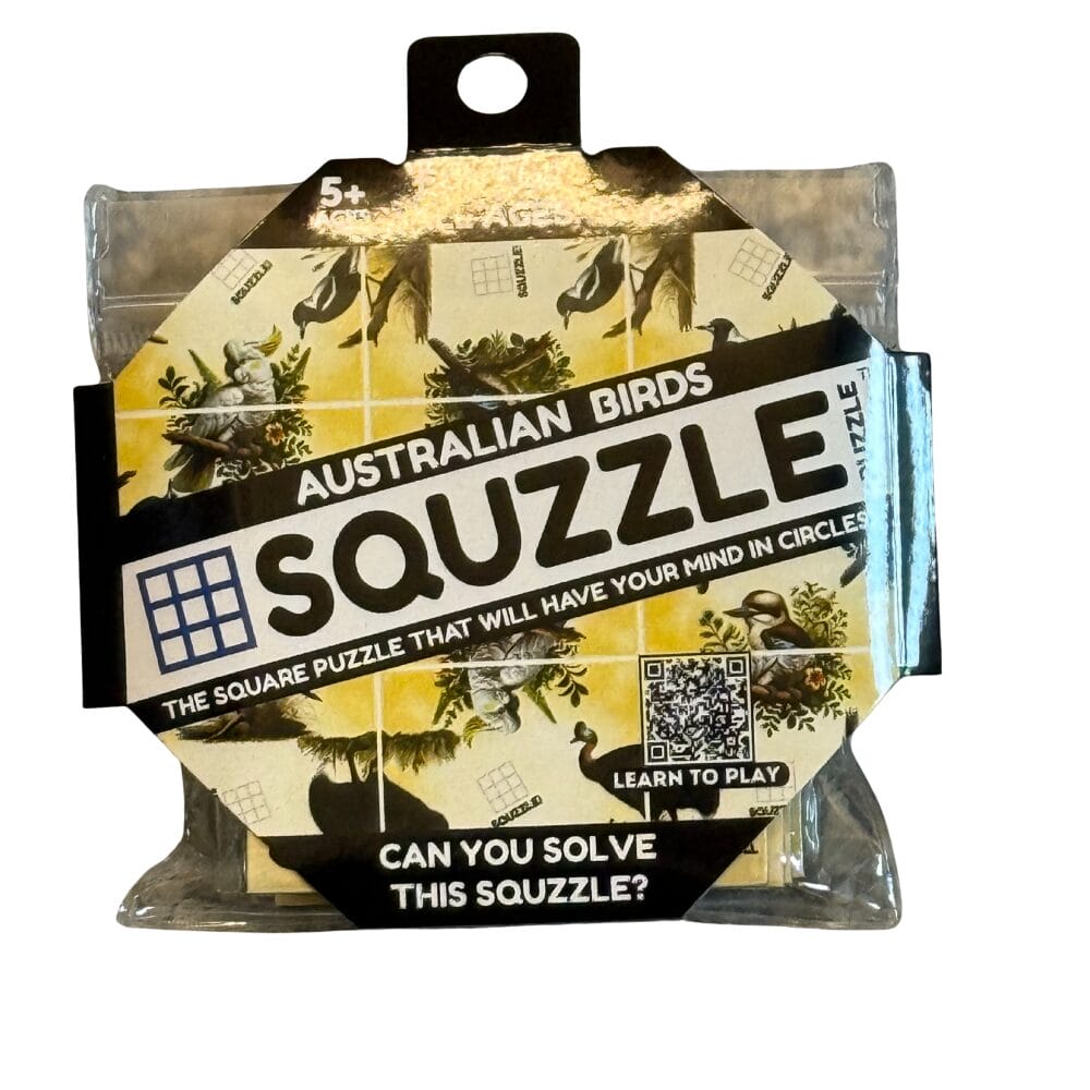 The Squzzle Australian Birds 9-piece square puzzle is visible in clear hanging retail packaging with a black and yellow themed label