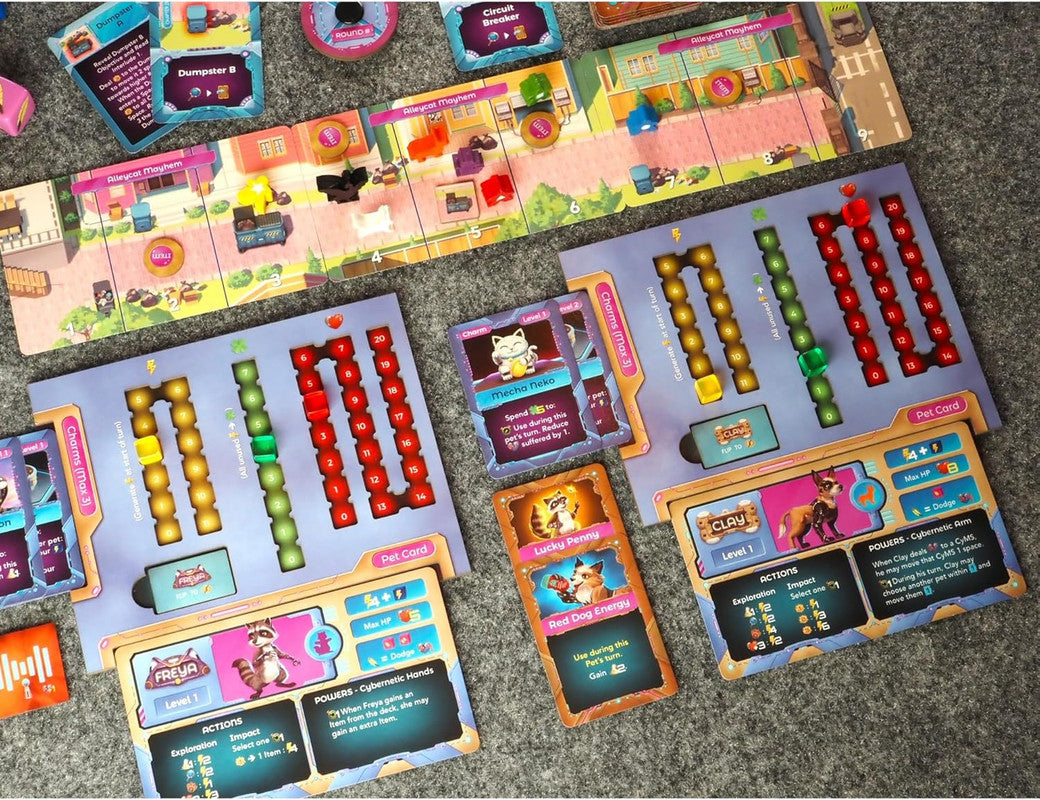 Overhead view of a colourful board game setup: a street board, pet character cards (raccoon, dog, cat), and various tokens on a grey game mat