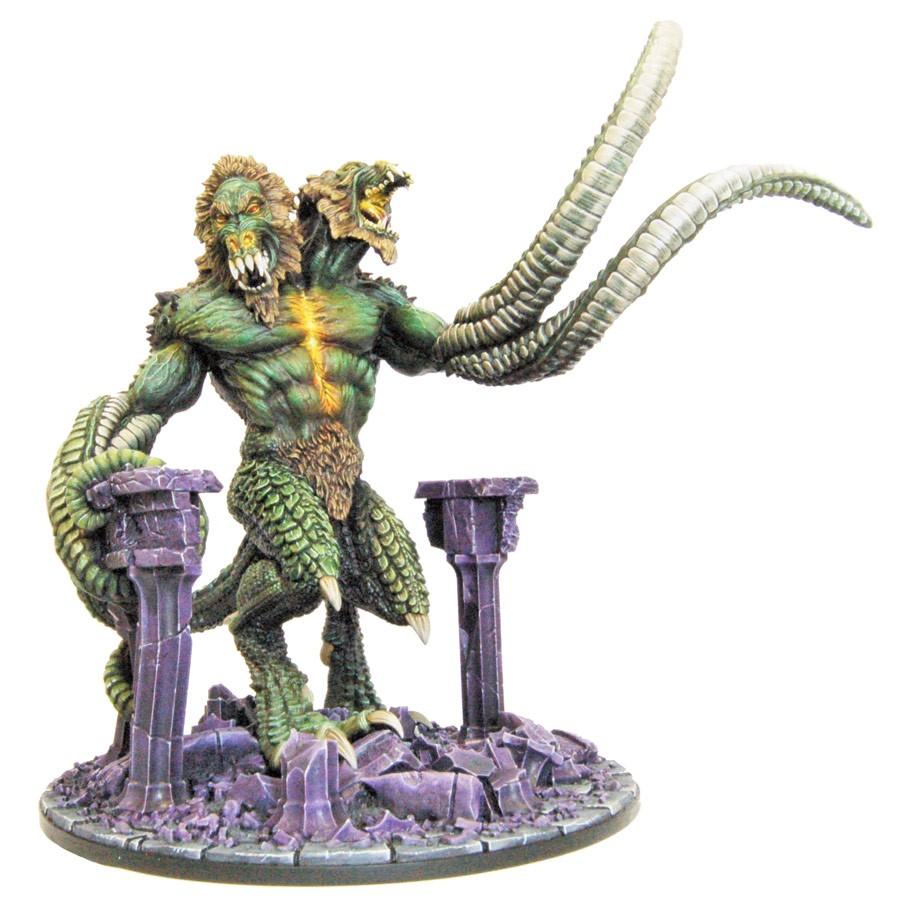 A green-skinned, two-headed Demon Lord Demogorgon miniature with lion and reptilian heads, scaled legs, and two long tentacles stands on a base of broken purple pillars