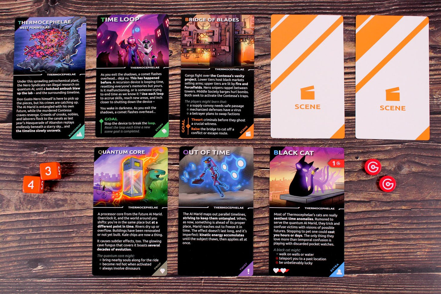 Top-down view of a tabletop game setup with several game cards dice and tokens spread across a wooden surface