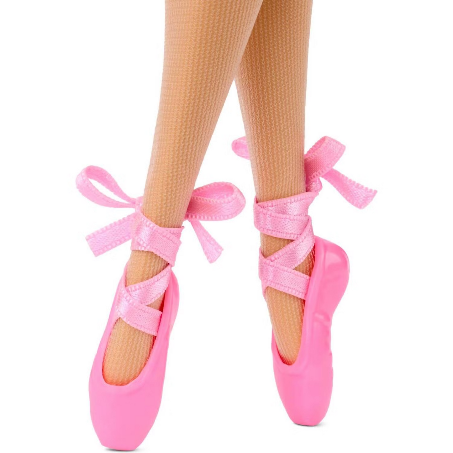 Barbie doll's legs in pink pointe ballet shoes with ribbons - posed on toes