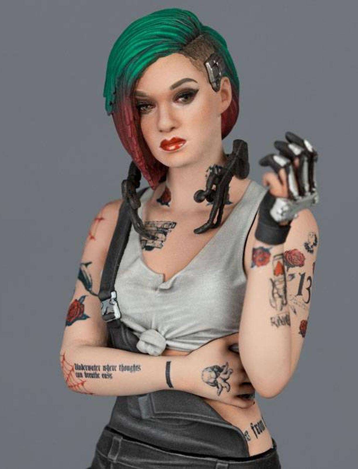 Judy Alvarez figure (Cyberpunk 2077) with green hair, shaved side, extensive tattoos, neck implants, and a cybernetic metallic hand