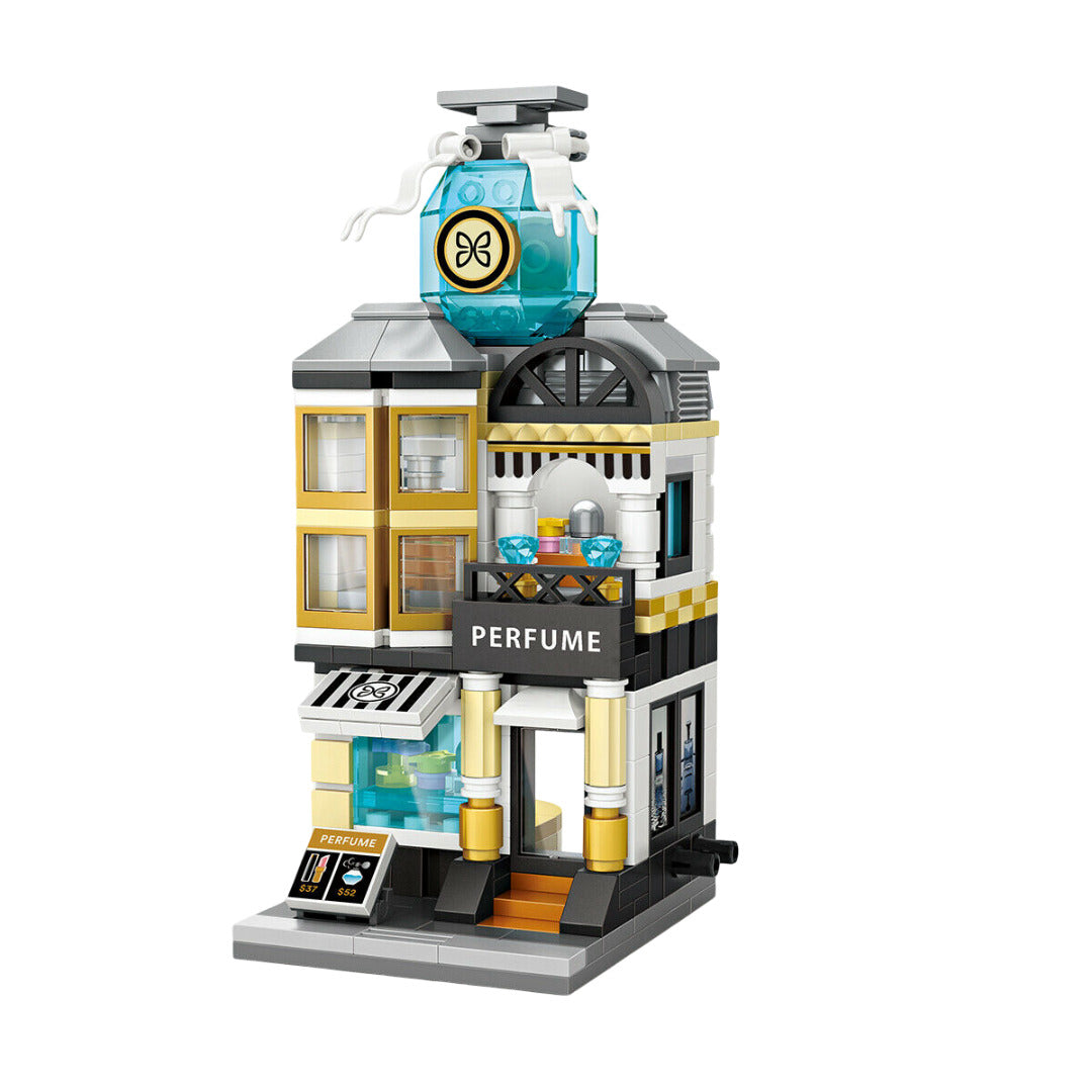 The Loz Street Mini Perfume Shop building set showcases a detailed three-story storefront in black, gold, and white, topped by a translucent blue fragrance bottle
