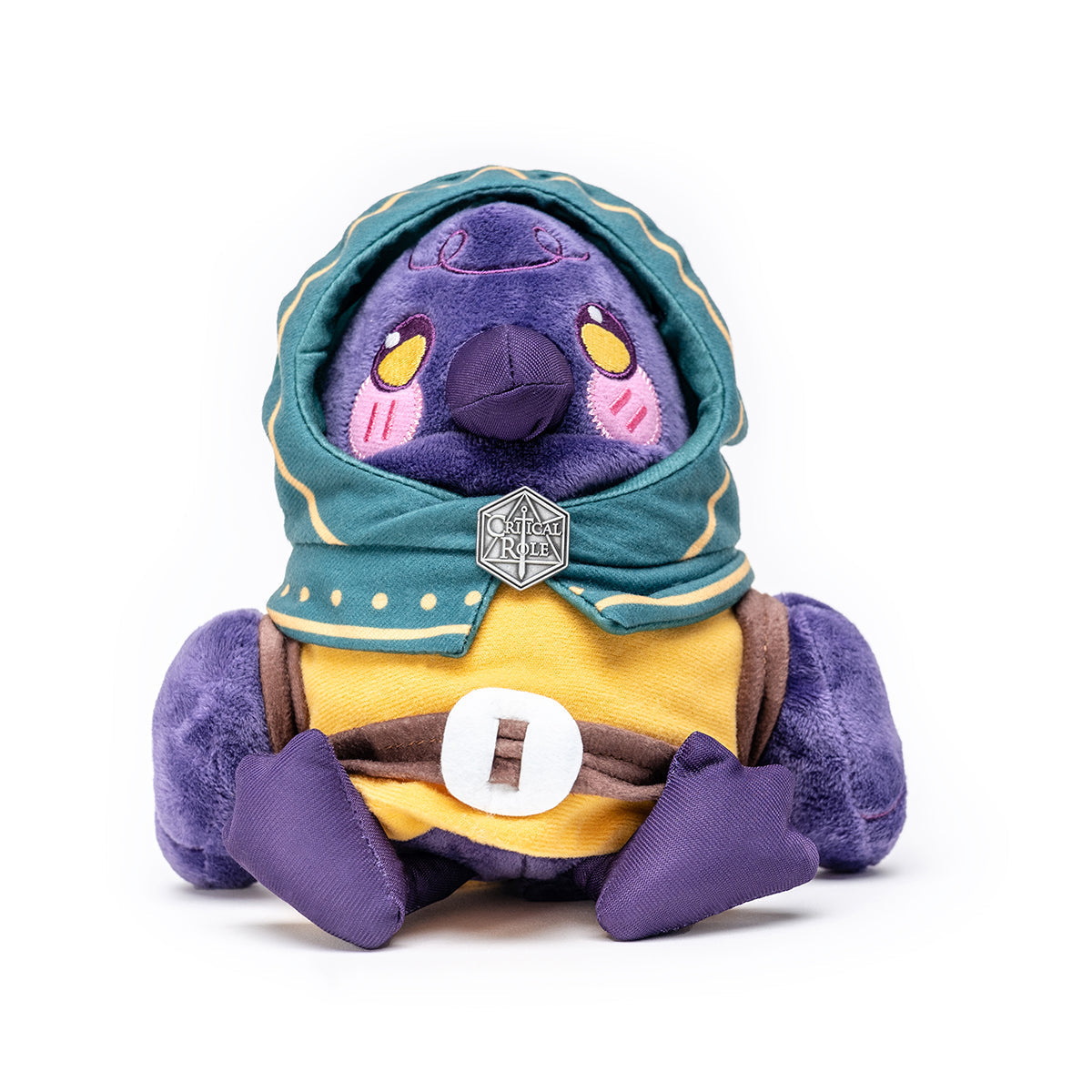 A purple bird plush in a teal hooded cloak with yellow trim and a Critical Role pin, sitting