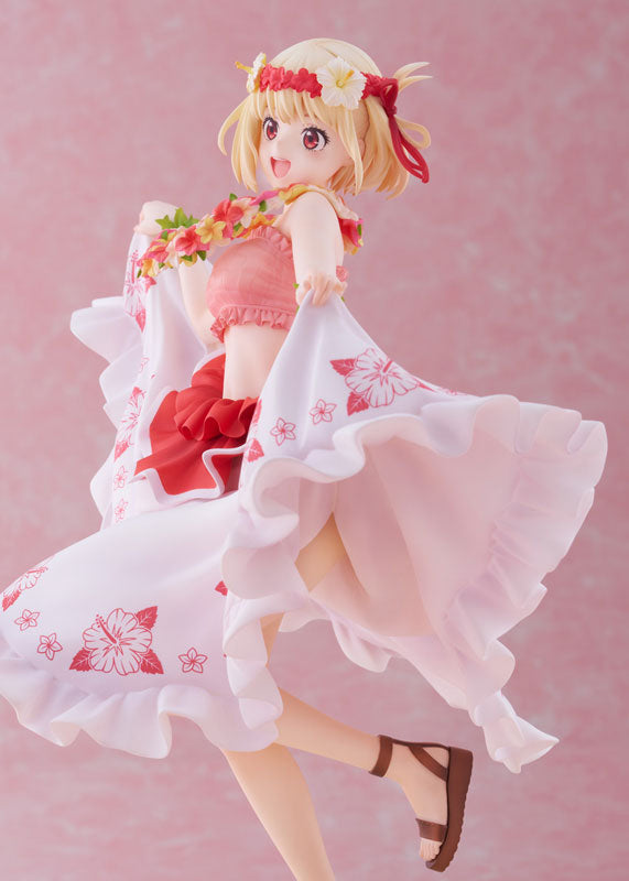 Side view emphasizing swimsuit design and pose