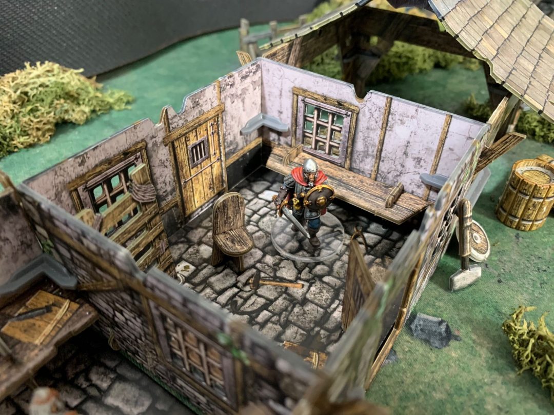 Tabletop RPG scene: Armored knight miniature stands in a medieval room with stone floor, wooden walls, bench, and chair.