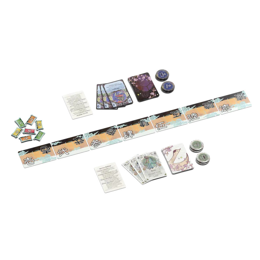 A Japanese "For the Emperor, board game laid out, featuring a long track with kanji, various illustrated card decks, and small tokens