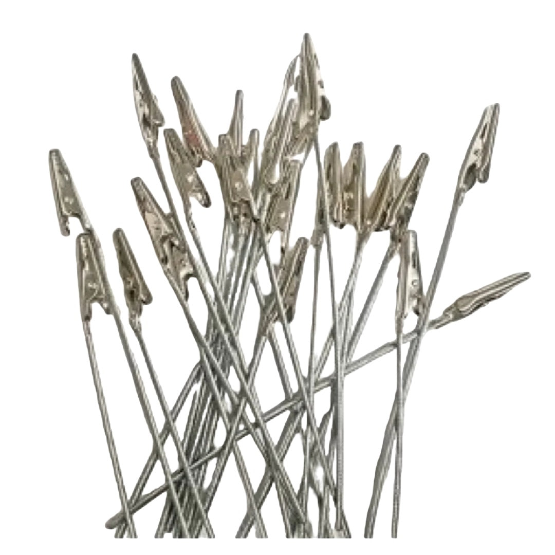 A cluster of silver alligator clips on flexible wire stems, commonly used for models or crafts