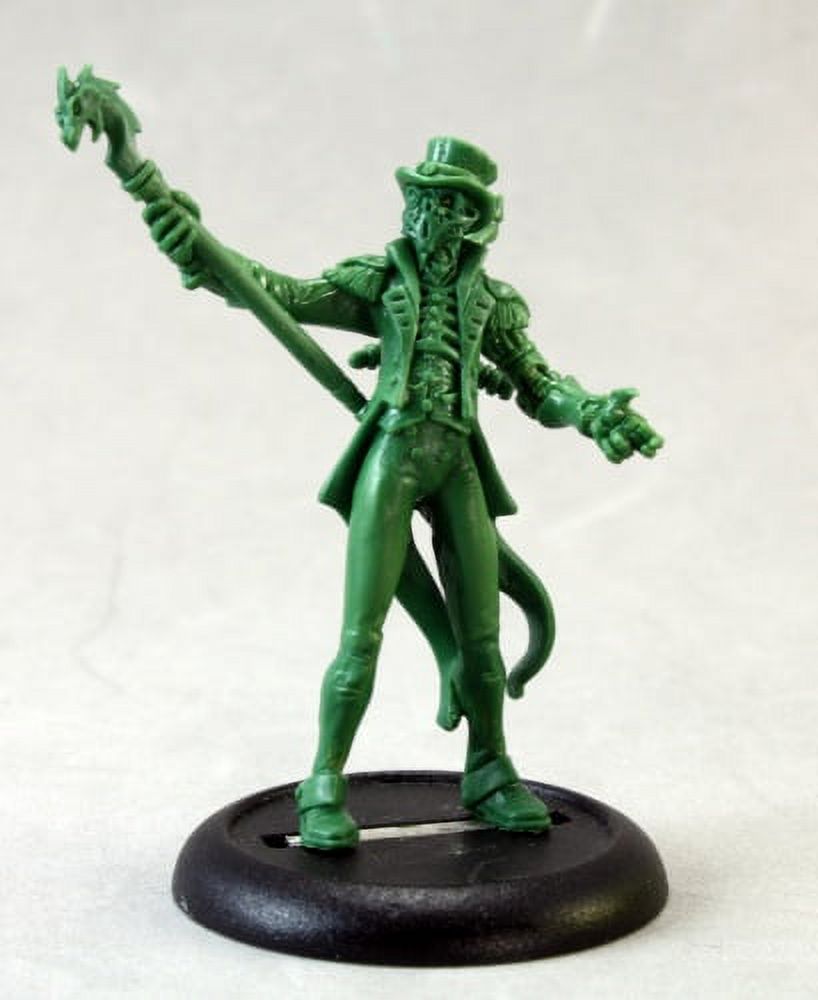 An unpainted green miniature of a skeletal figure in a top hat and long coat, holding a staff with a beast head