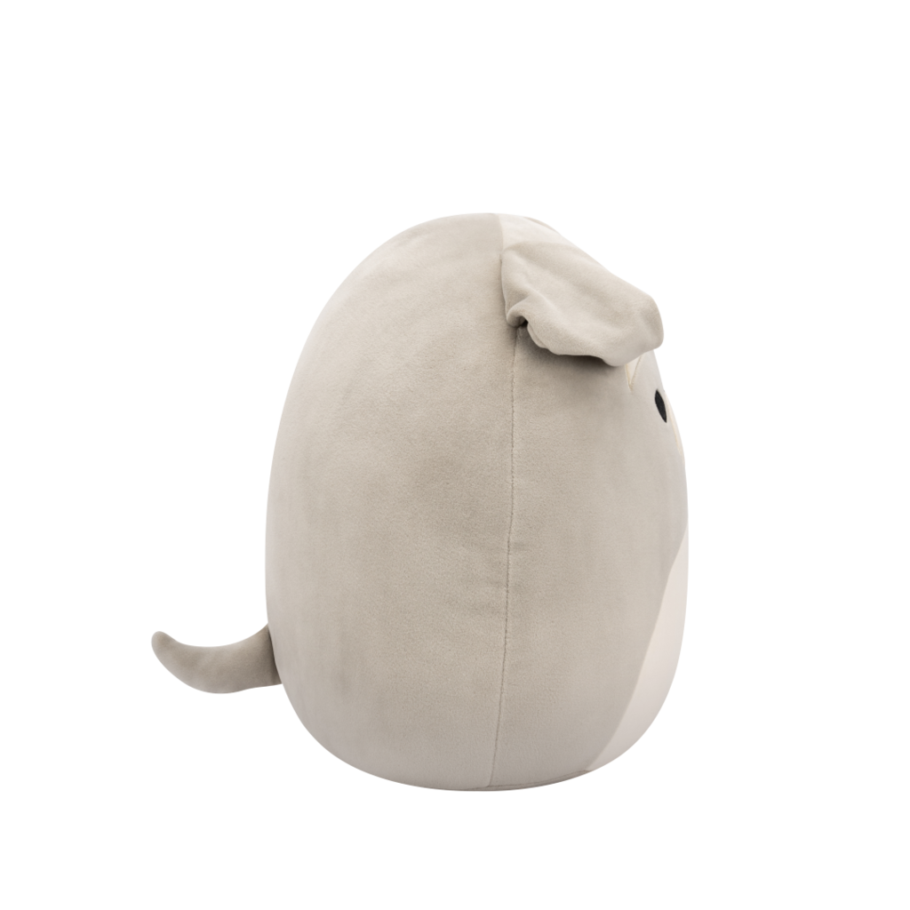 Side view of soft grey plush animal toy with black eyes, white eyebrows, and a white beard on a black background