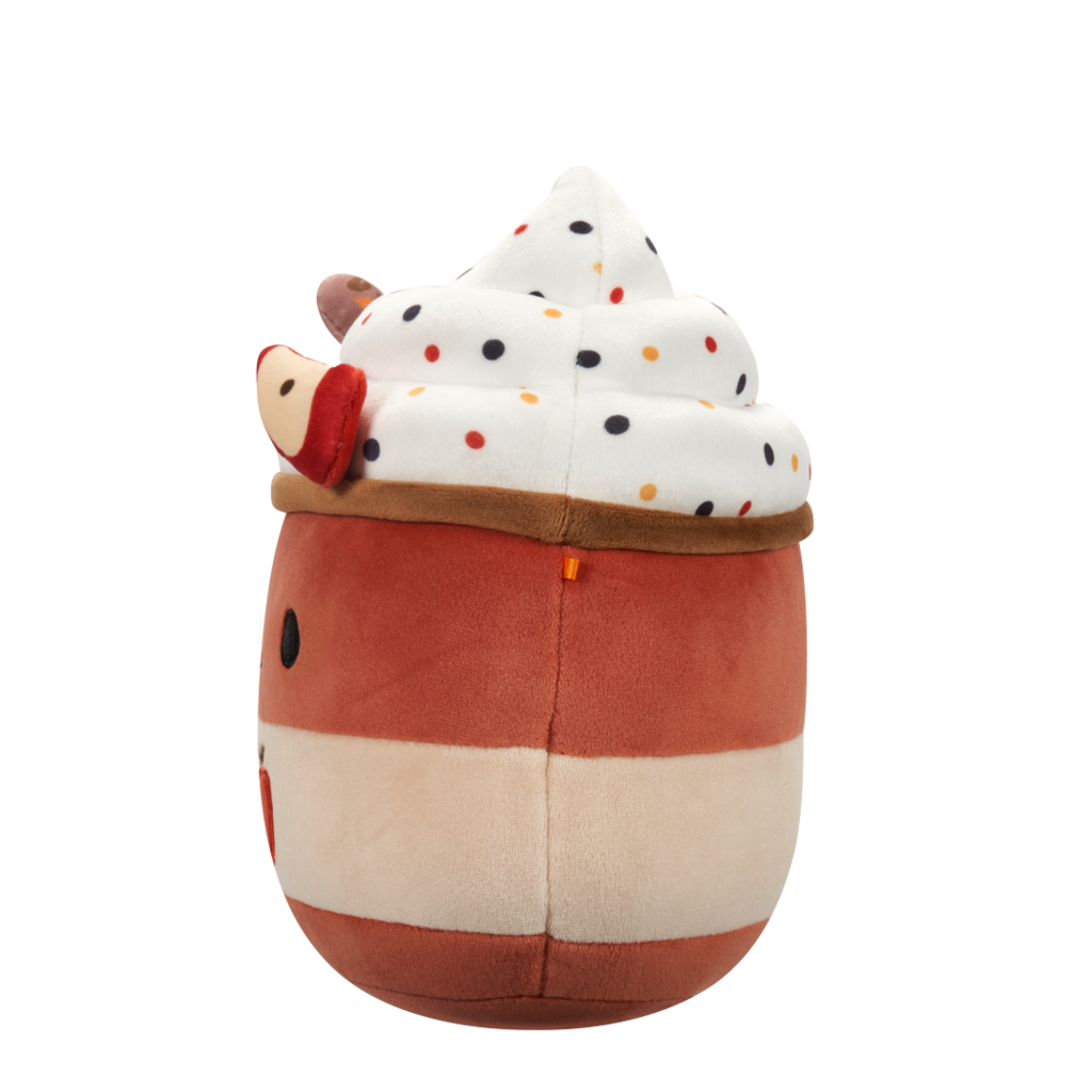 Side view of apple pie plush toy with whipped cream, colorful sprinkles, a smiling face, an apple slice, and an embroidered apple on its striped body