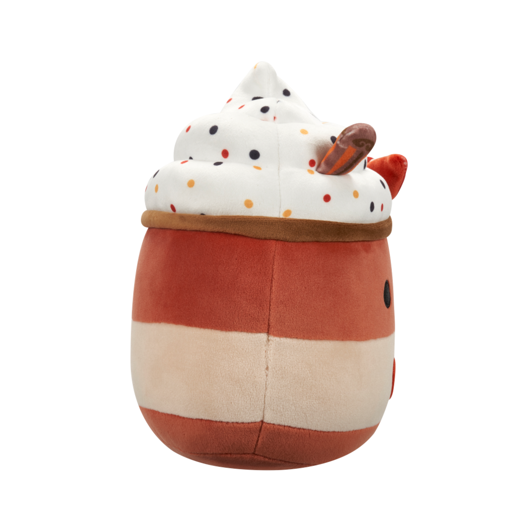 Side view of apple pie plush toy with whipped cream, colorful sprinkles, a smiling face, an apple slice, and an embroidered apple on its striped body