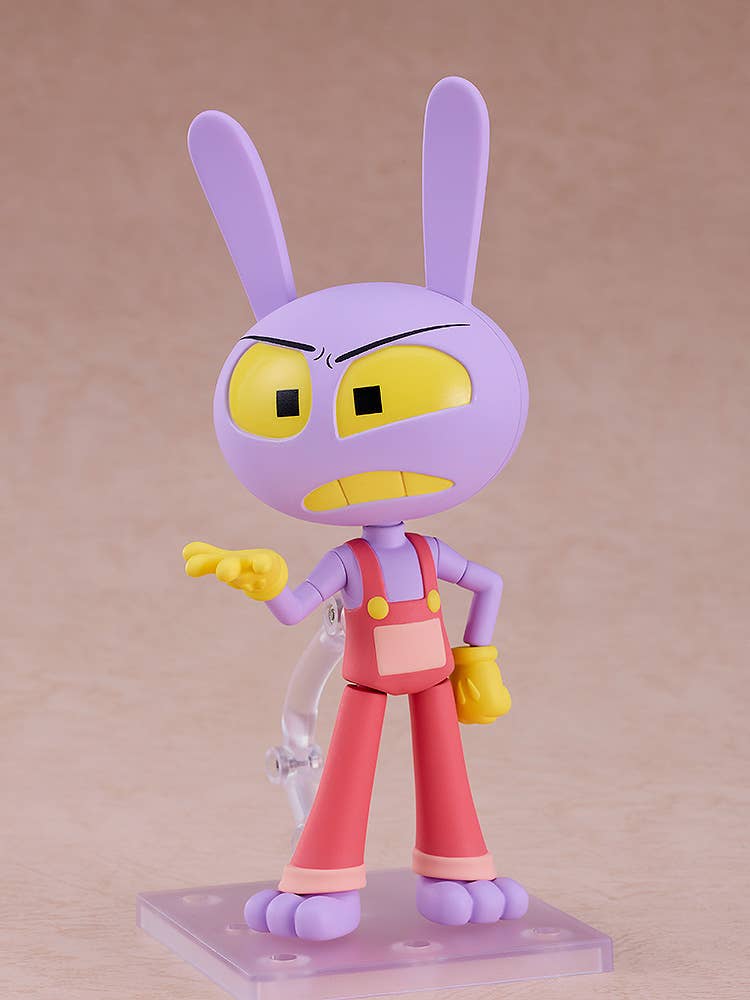 Angry purple rabbit action figure in red overalls and yellow gloves, posing with one hand extended