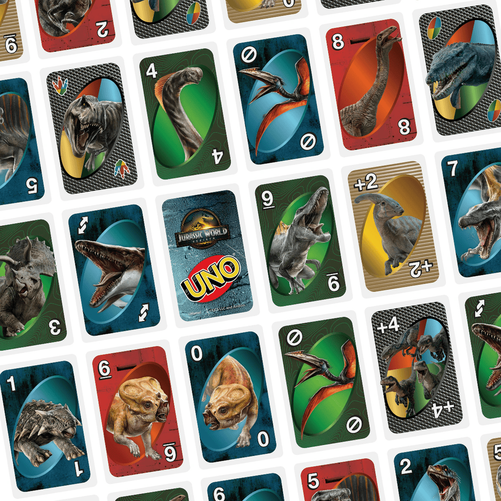 A spread of Jurassic World UNO cards, each featuring a dinosaur illustration, numbers, and special game symbols