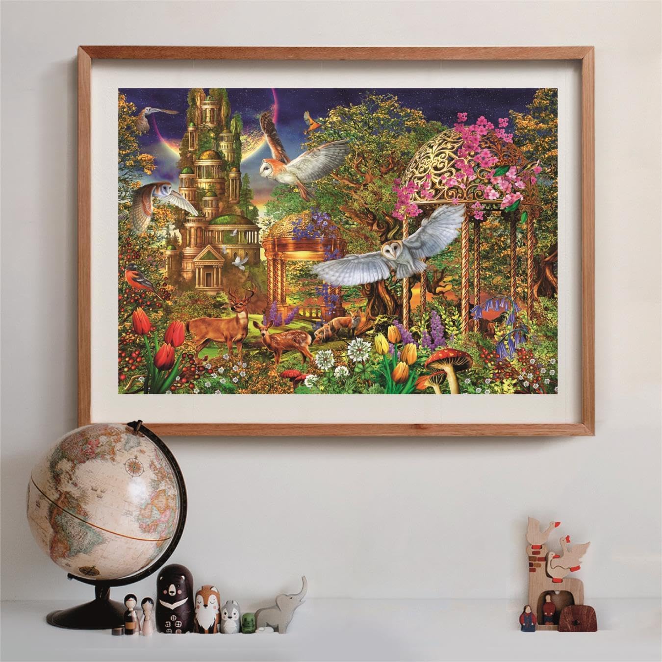 Framed vibrant fantasy art depicts an enchanted forest with a tall castle, flying owls, deer, and colorful flowers