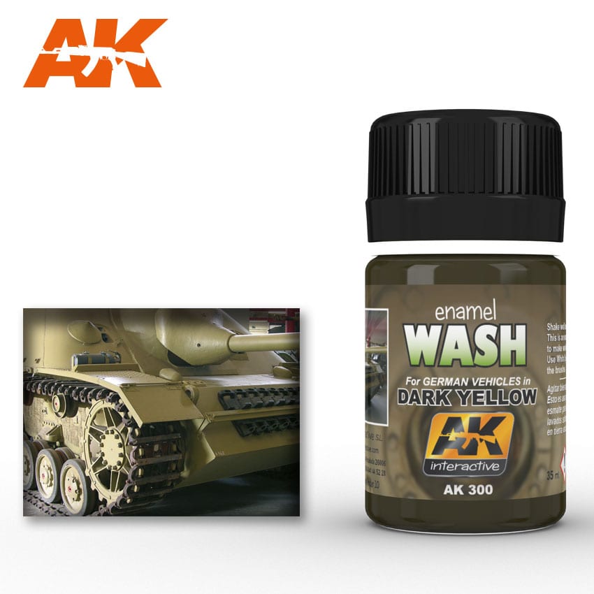 AK enamel wash bottle for dark yellow German vehicles, next to a close-up of a tank model's tracks and gun