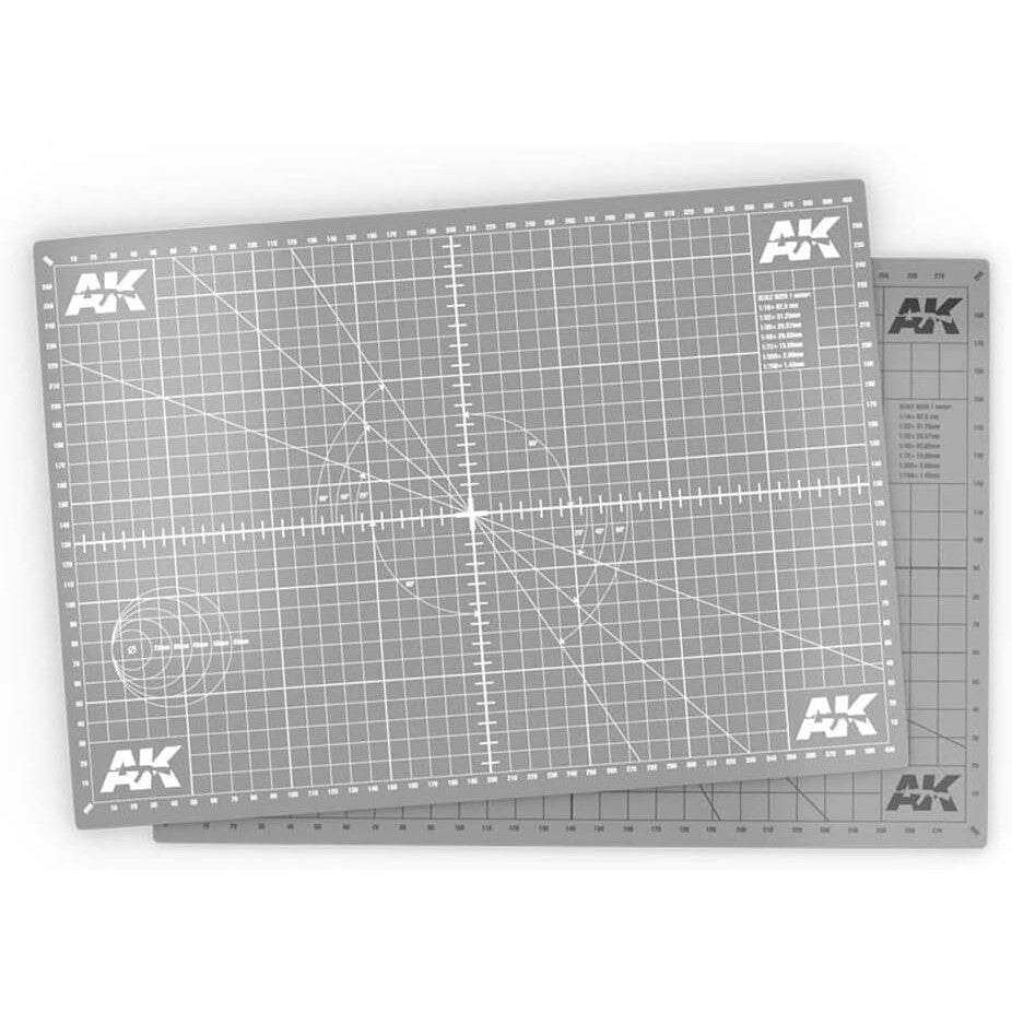 Gray AK cutting mat with white grid lines and measurement guides - used for precise crafting