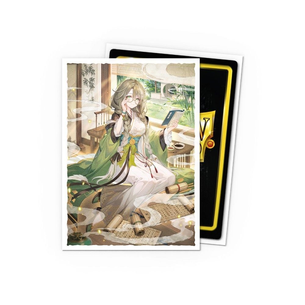 Anime woman in green robes and glasses reading a book, surrounded by scrolls; illustration on trading card sleeve
