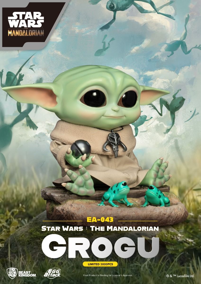 Grogu Star Wars collectible figure with frogs on a mossy base