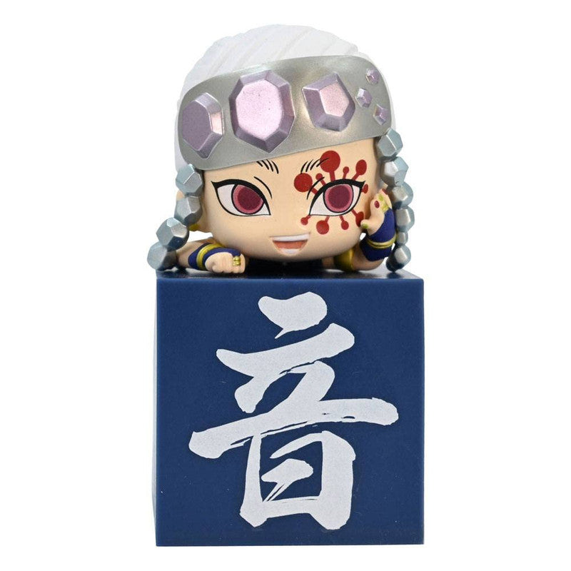 Demon Slayer Chibi Tengen Uzui figurine on a dark blue base with white kanji