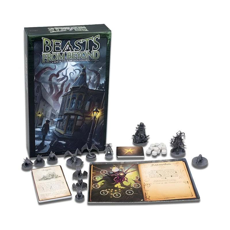 Beasts From Beyond expansion box with tentacled monster art, game board, cards, and creature miniatures laid out