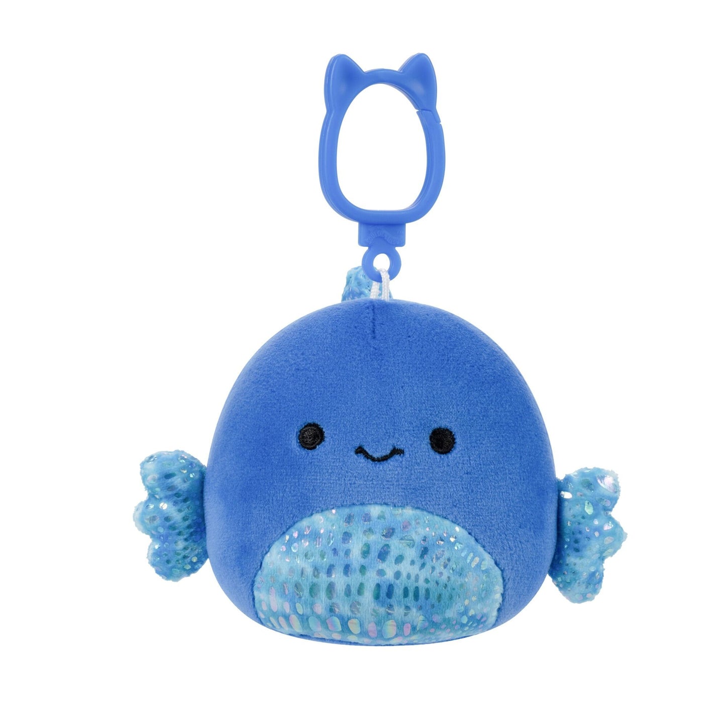 A smiling blue plush whale keychain with a sparkly belly and fins, hanging from a blue clip