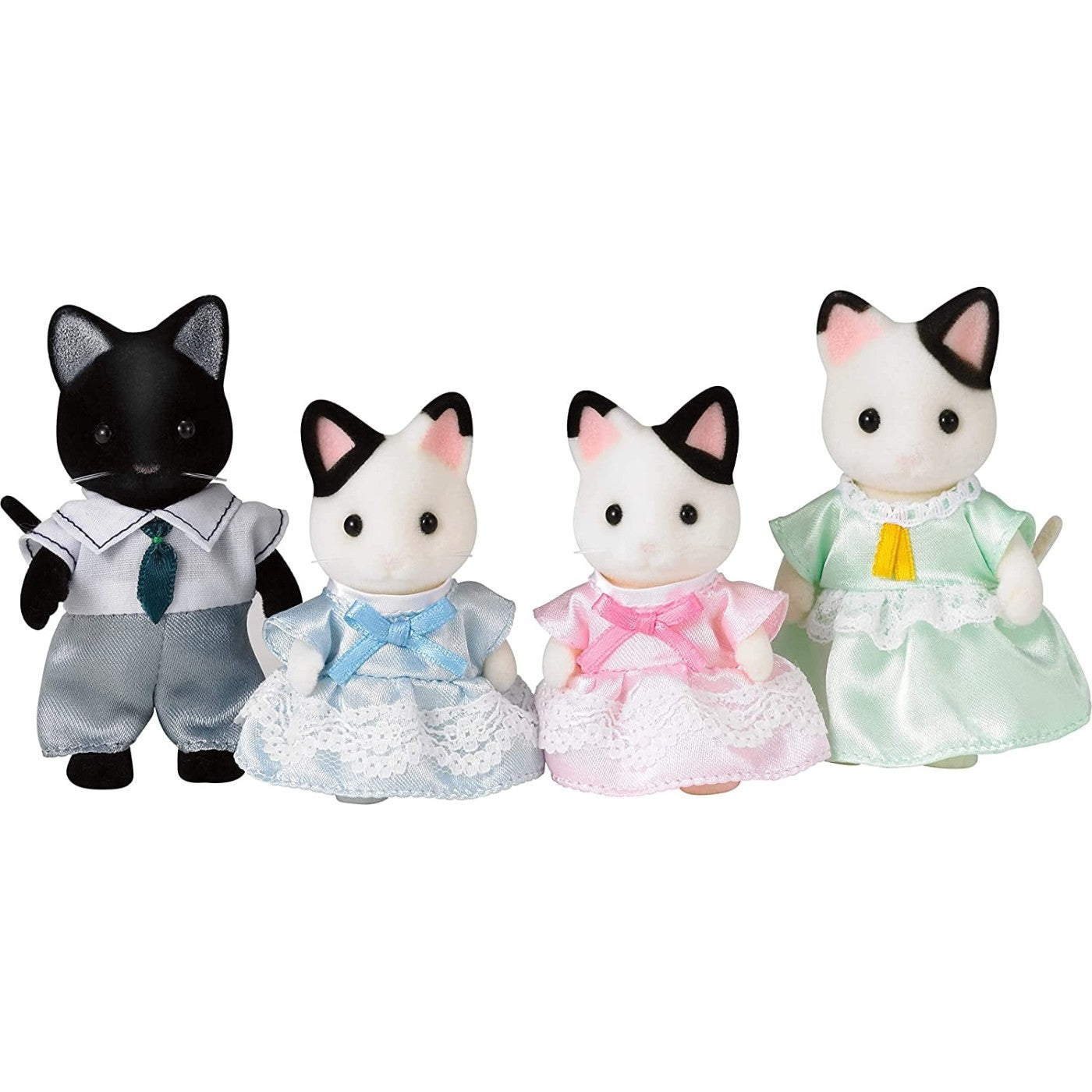 A set of four flocked cat toy figures (a black father, white mother, and two kittens) dressed in formal clothing