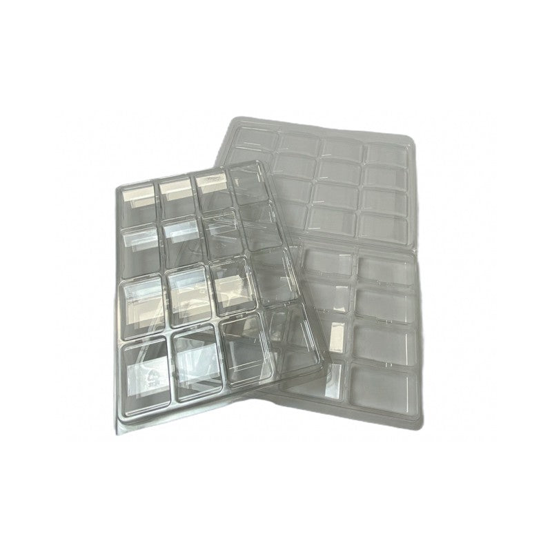 Two clear plastic packaging trays, each with multiple rectangular cells, partially overlapping