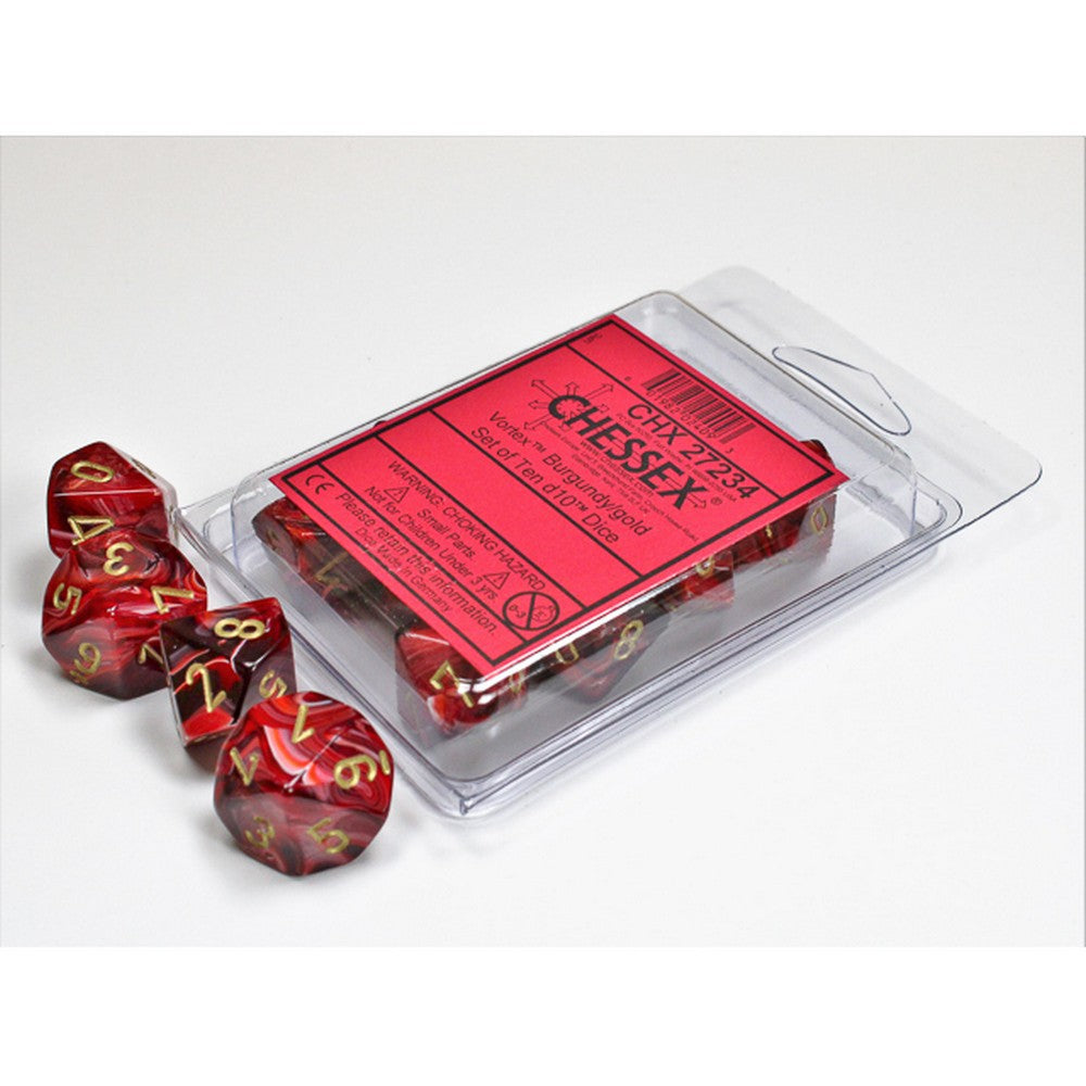 A set of Chessex Vortex burgundy/gold d10 dice, some spilled from their clear blister pack