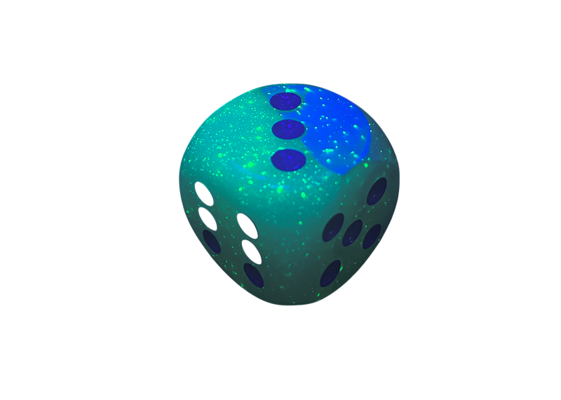 A Chessex Gemini speckled green-blue d6 dice with a bright blue section, showing 3 blue pips, 4 white pips, and 5 blue pips
