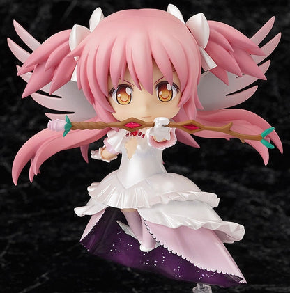 Pink-haired anime figure with white wings, white and purple dress, holding an ornate staff